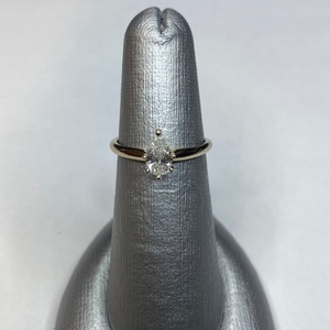  Elegant 14kt White Gold Pear-Cut Diamond Solitaire