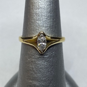  Sleek & Sophisticated: 14kt Yellow Gold Marquee Solitaire Ring